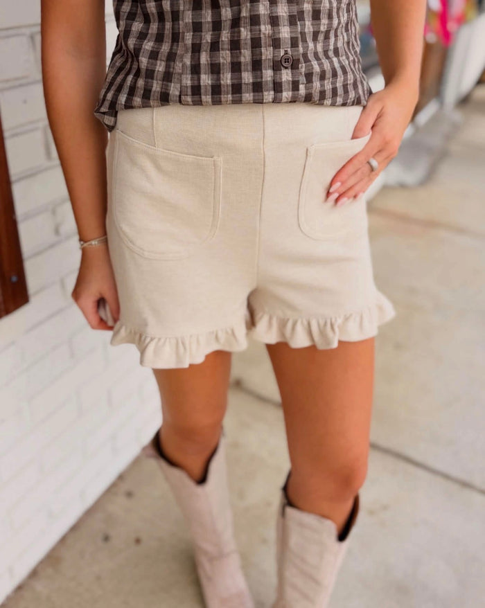 Knit Shorts With Pockets And Ruffle Hems