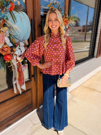 Floral ¾ balloon sleeve top with a stand collar and decorative frog button detail