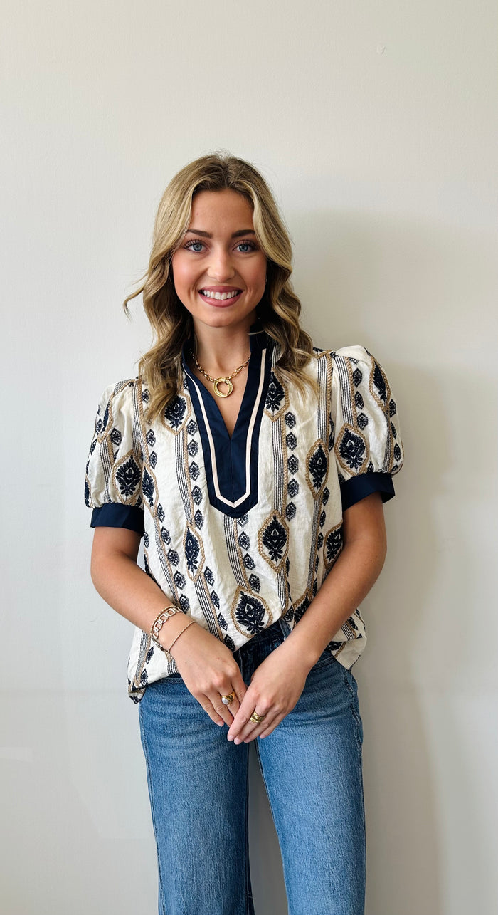 Abstract pattern embroidered short puff sleeve top
