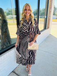 Abstract zebra print elbow sleeve midi dress