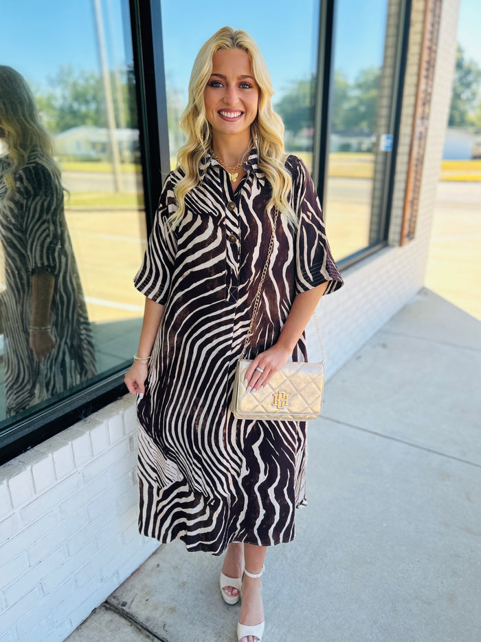 Abstract zebra print elbow sleeve midi dress