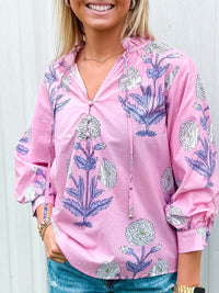 Floral print ¾ cuff bubble sleeve pullover top.