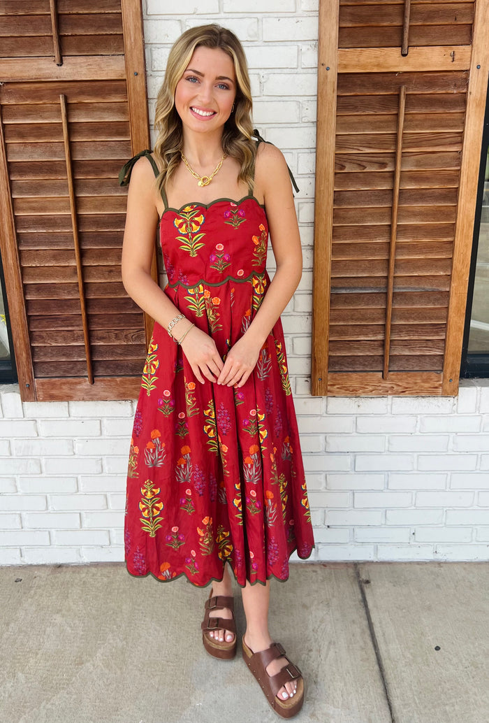 Floral print tie strap midi dress featuring scalloped straight neckline