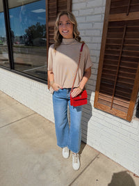 Solid short sleeve pullover top featuring mock neck