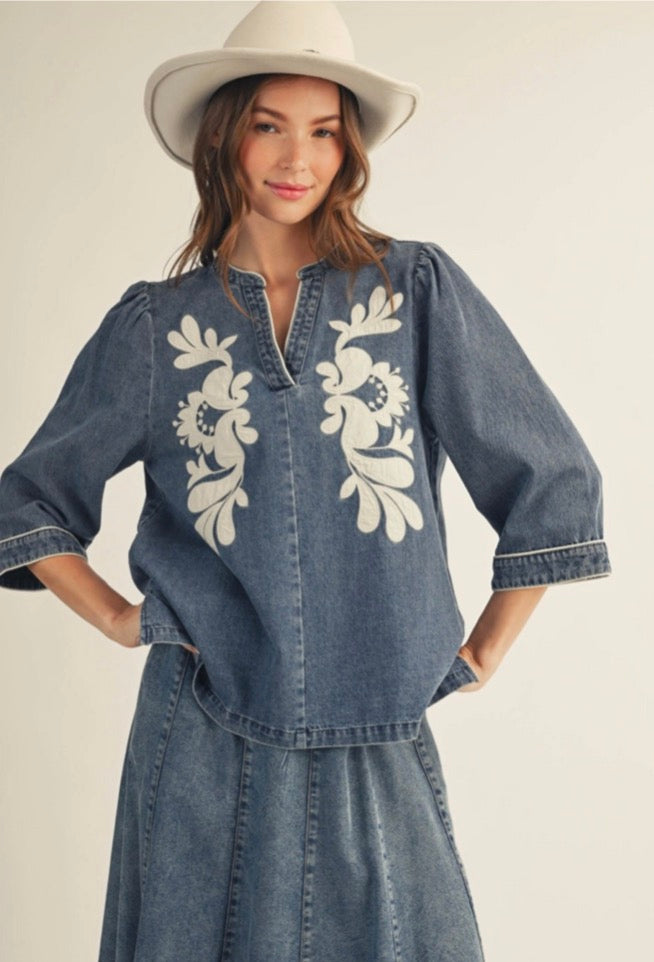 3/4 sleeves washed denim top with floral applique, piping detail.