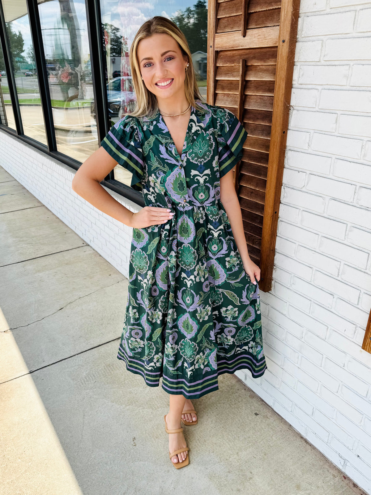 Multi-print midi dress featuring contrast accent binding detailing flutter sleeves and hem