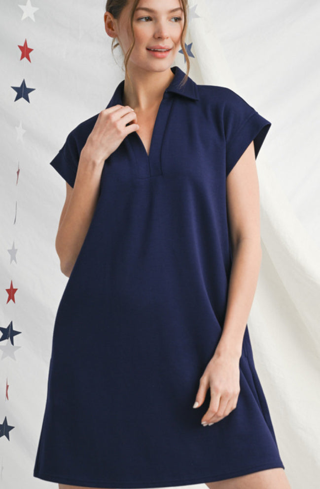 Solid dress with open collared neck