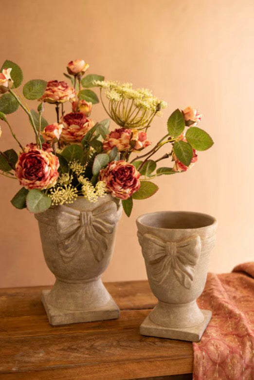 Concrete Urns with Bow Detail