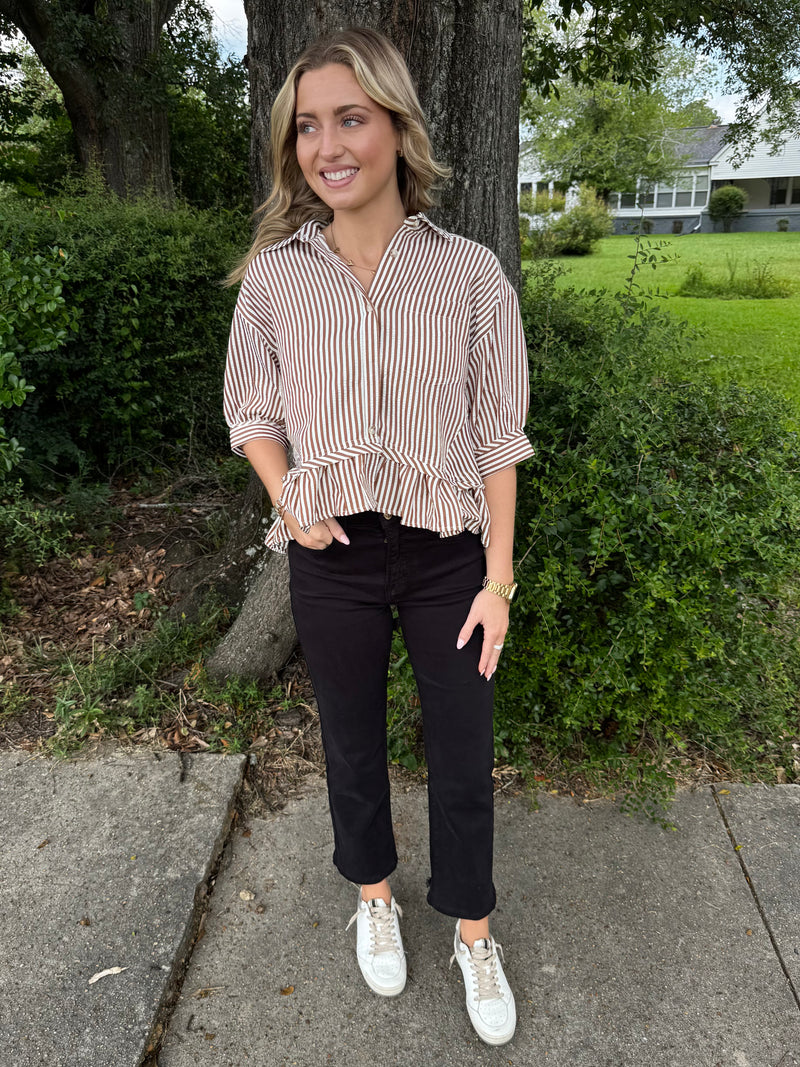 Stripe pattern cuff band ¾ sleeve ruffle hem button front closure top.