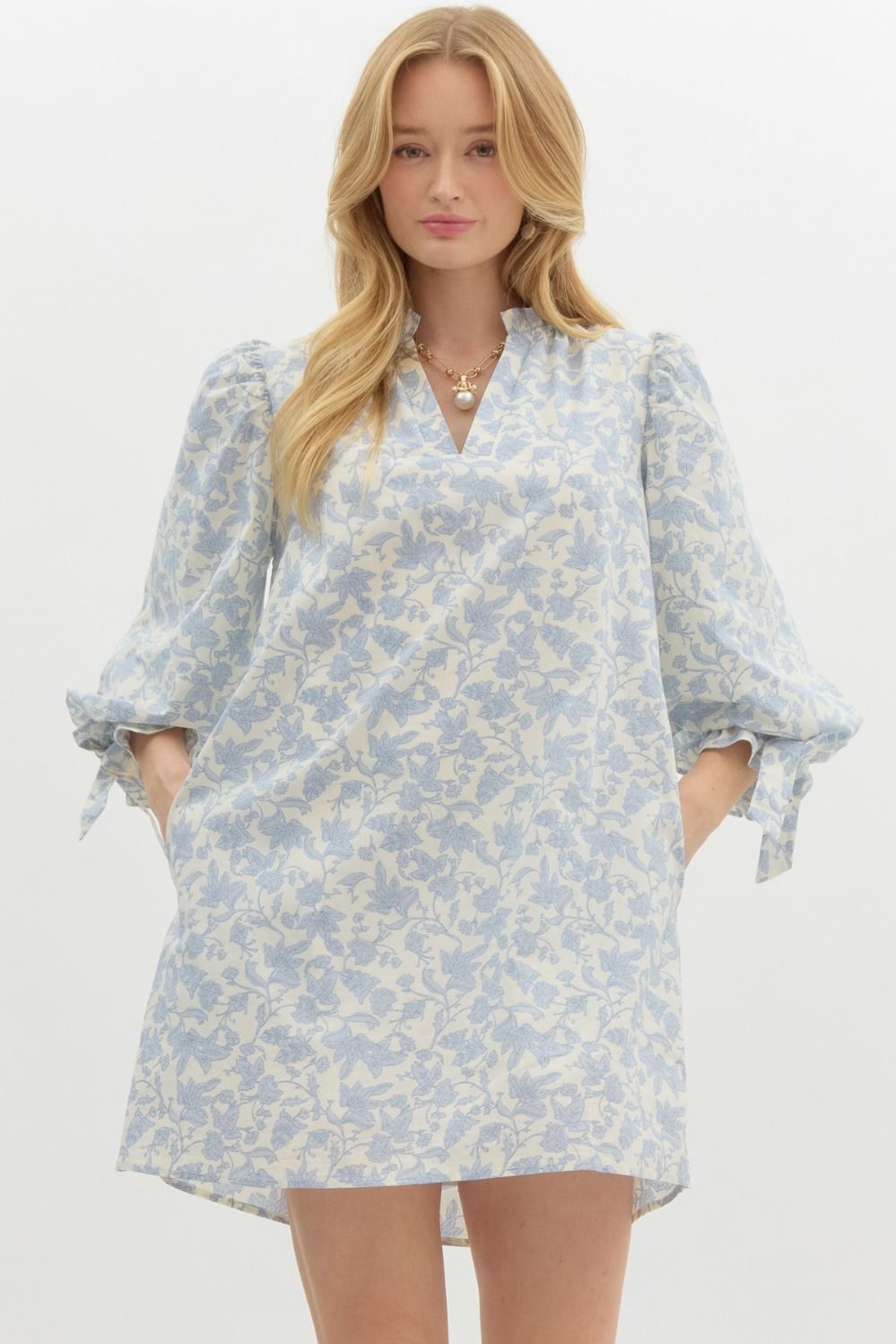 Floral print pullover mini dress feauring ¾ puff sleeve