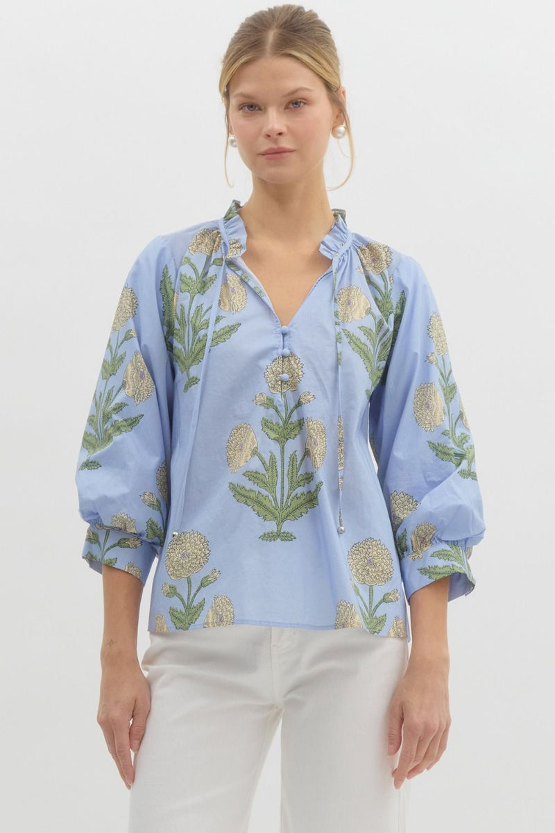 Floral print ¾ cuff bubble sleeve pullover top.