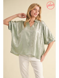 Plus Metallic top with open collared neck, Half dolman sleeves, and stretch-band cuffs.