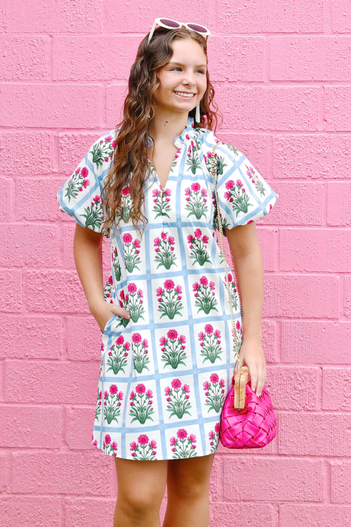 Floral pattern short bubble sleeve pullover mini dress.