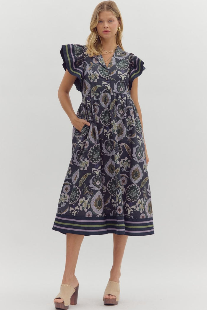 Multi-print midi dress featuring contrast accent binding detailing flutter sleeves and hem