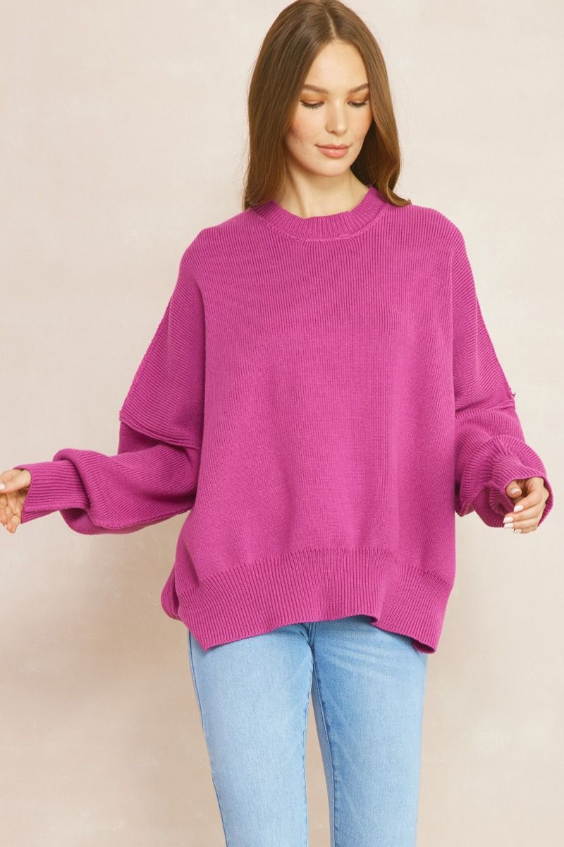 Oversized knit sweater featuring drop shoulder