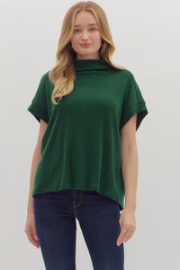 Solid short sleeve mock neck top featuring rolled cuffs