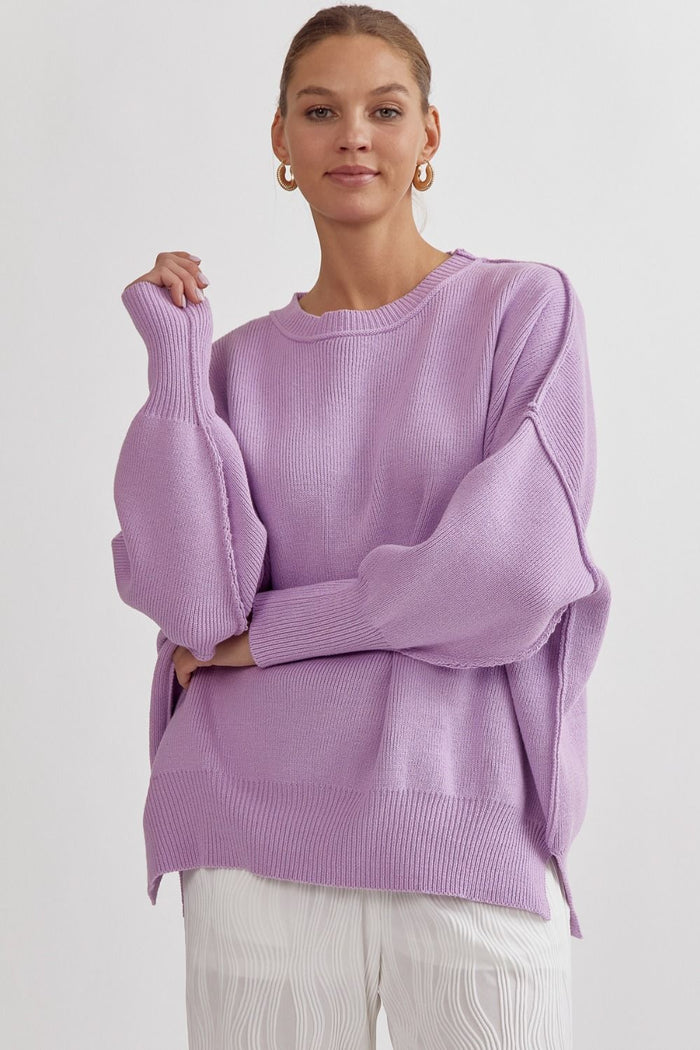 Oversized knit sweater featuring drop shoulder