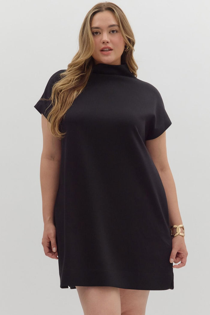 Solid jersey mock neck pullover mini dress.