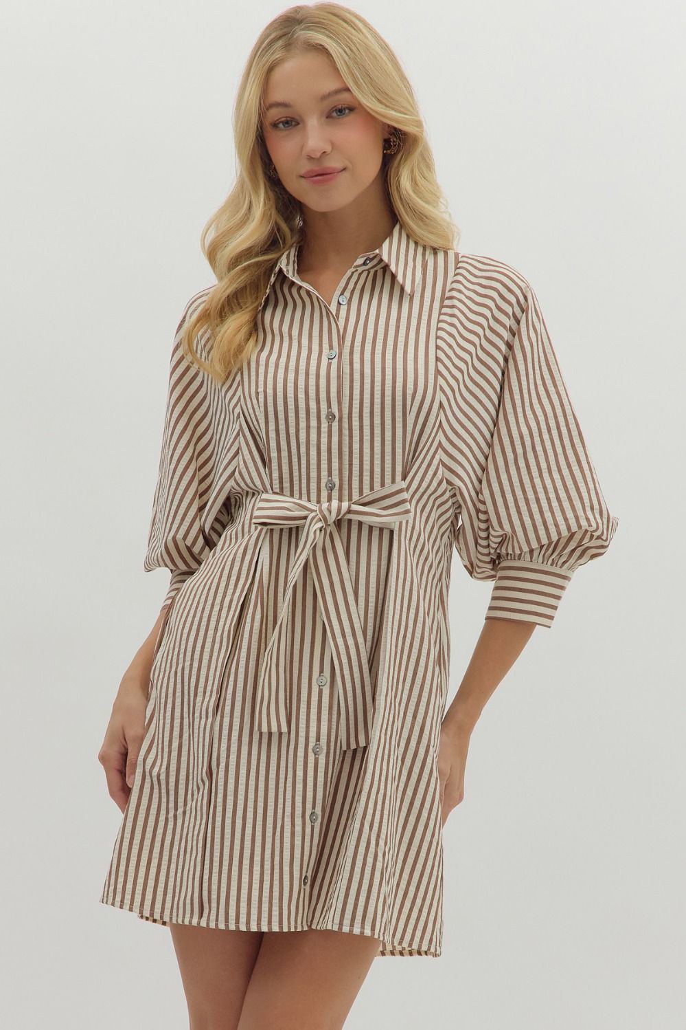 Striped 3/4 sleeve mini shirt dress featuring self-tie belt at waist.