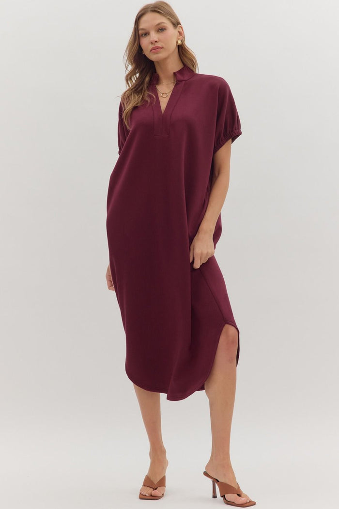 Solid short sleeve midi dress featuring band collar V-neck