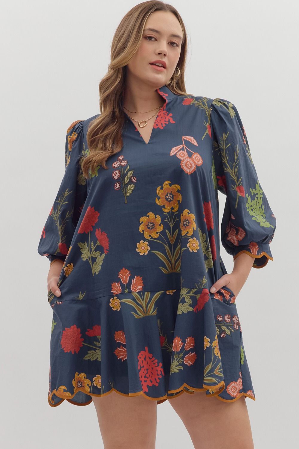 Floral print puff sleeve mini dress featuring V-neck and scallop hem