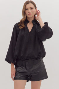 Solid balloon sleeve V-neck top featuring pleated shoulder detail
