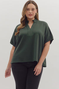 Solid short sleeve top featuring split V-neck with collar band