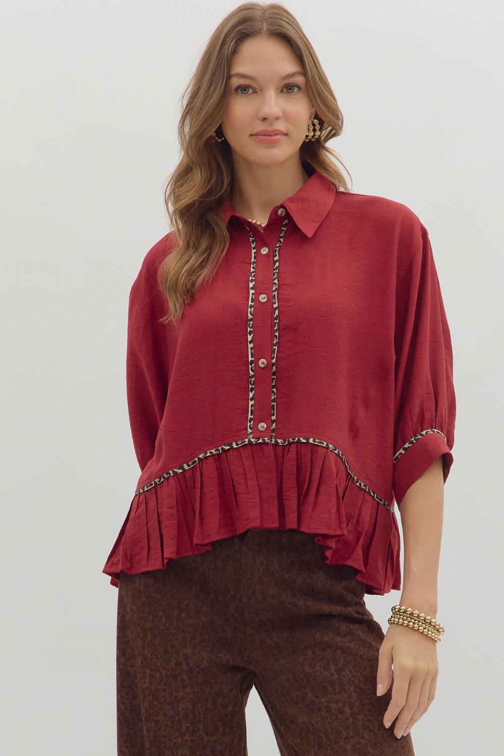 Solid cuff band ¾ dolman sleeve ruffle hem top