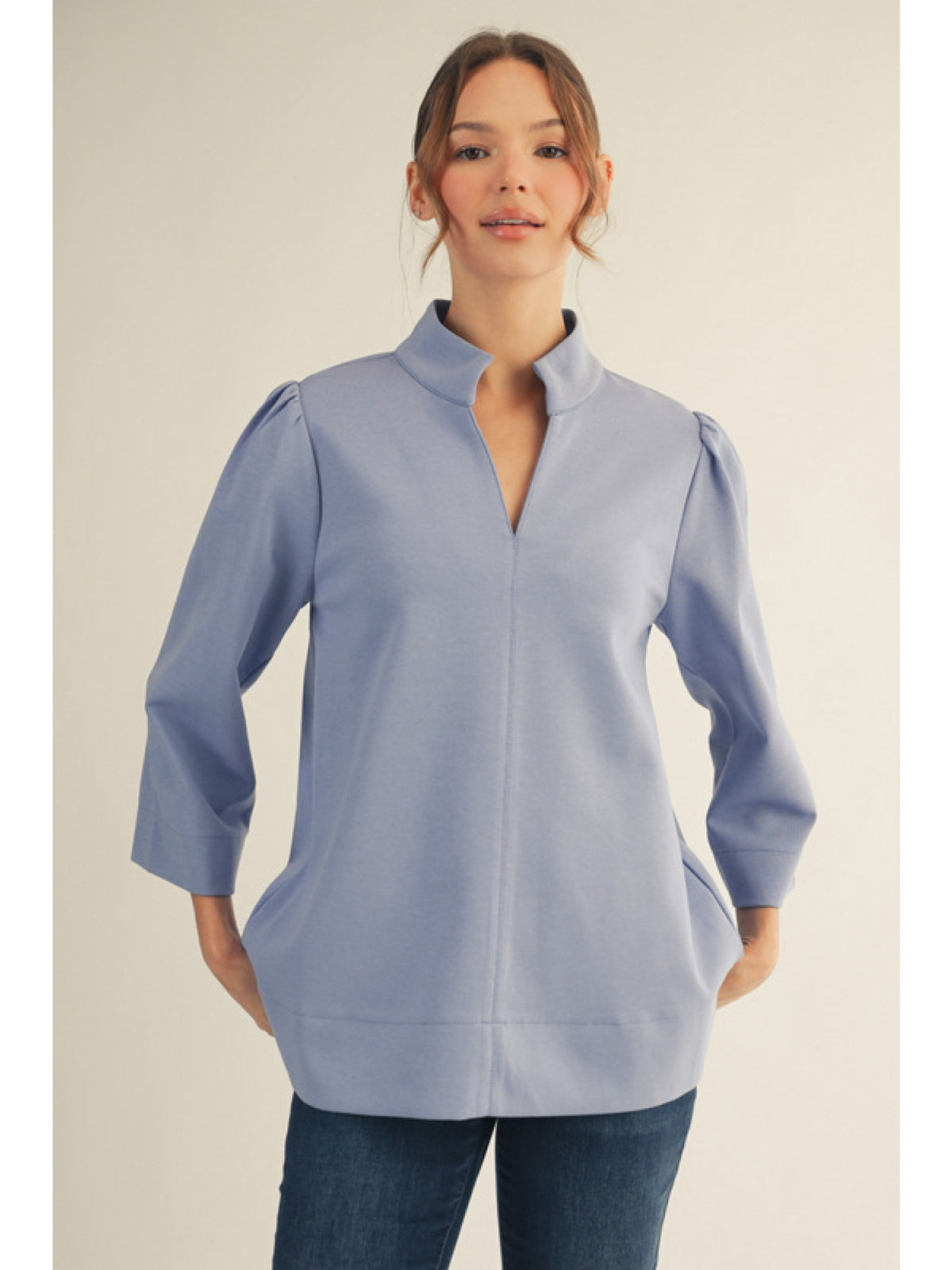 3/4 sleeves puff shoulder top, standing neckline, side slit.