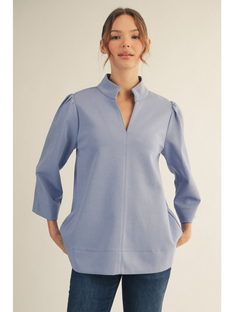 3/4 sleeves puff shoulder top, standing neckline, side slit.