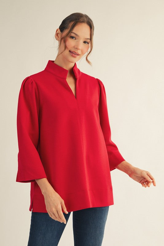 3/4 sleeves puff shoulder top, standing neckline, side slit.