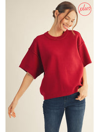 Plus size drop shoulder comfy sweater top with raw edge detail.