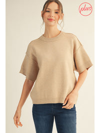 Plus size drop shoulder comfy sweater top with raw edge detail.