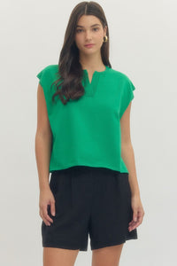 Solid short sleeve knit top featuring ribbed V-neck detail