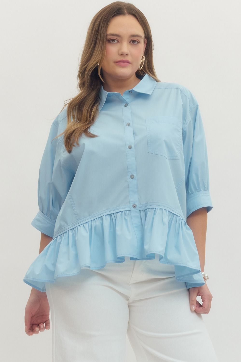 Plus Solid 3/4 sleeve button-down top featuring ruffle hem detail