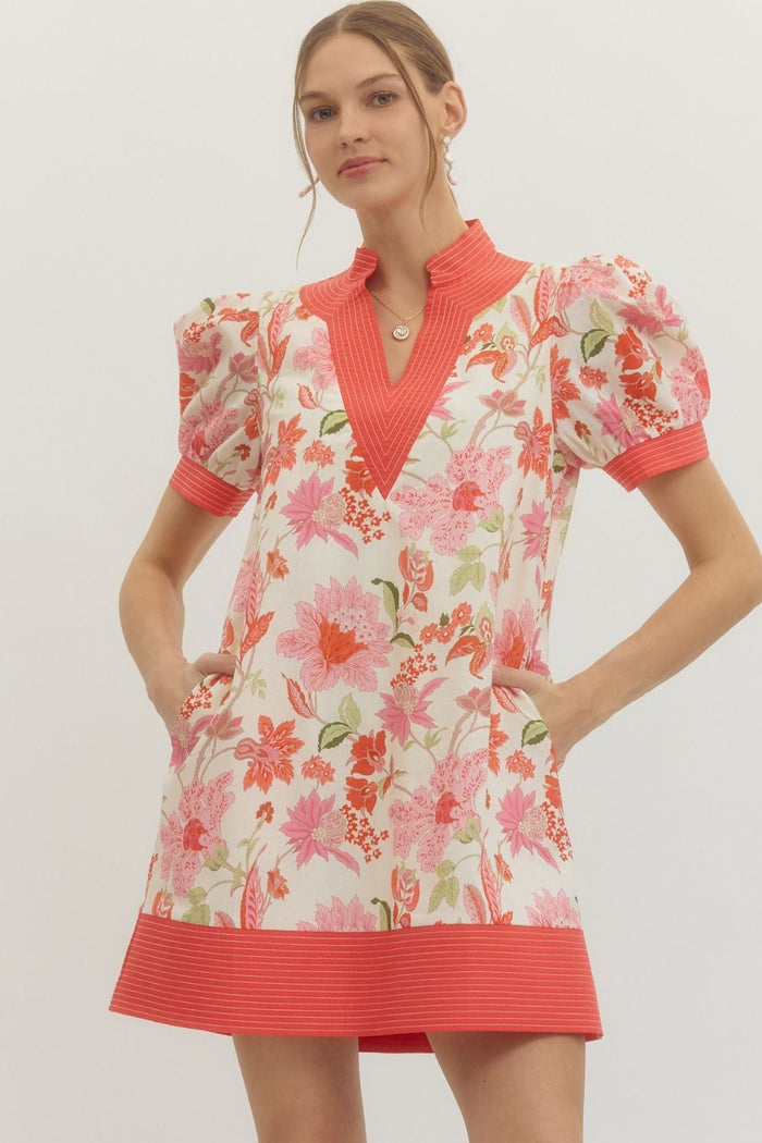 Floral print short puff sleeve pullover mini dress featuring stitch accent contrast band.