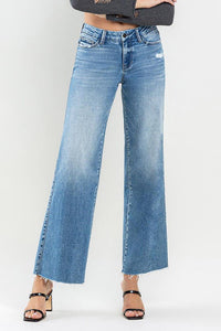 VERVET MID RISE RAW HEM WIDE LEG JEANS