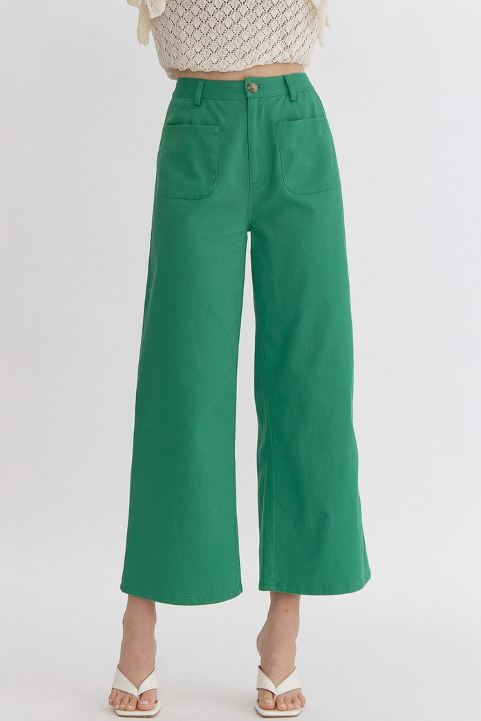 High waisted wide leg pants featuring pockets at front.