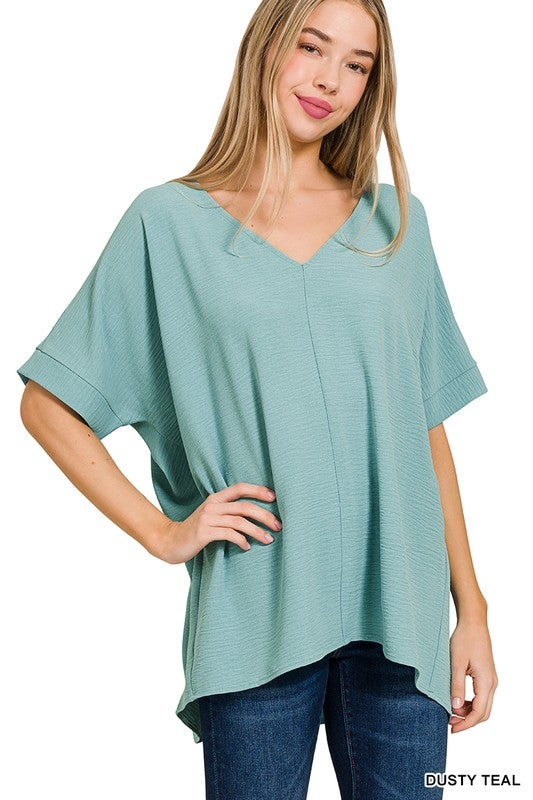 WOVEN AIRFLOW V-NECK DOLMAN SHORT SLEEVE TOP