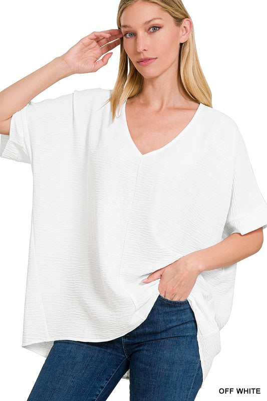 WOVEN AIRFLOW V-NECK DOLMAN SHORT SLEEVE TOP