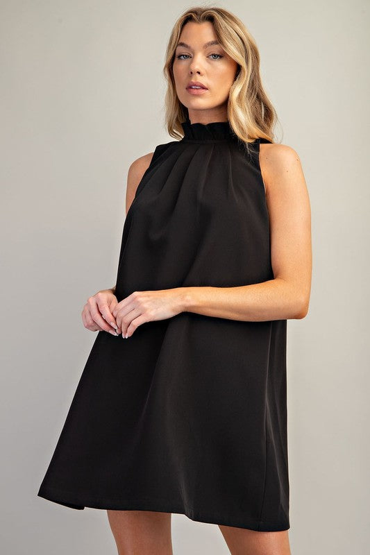 Ruffled edge high neck with tie back