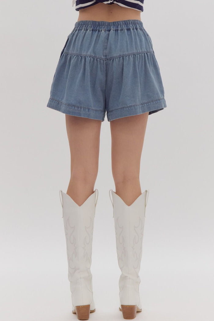 Denim flared high-waisted shorts featuring button closure.