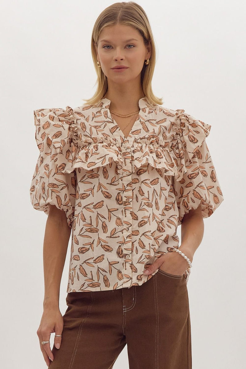 Printed button up v-neck short sleeve top featuring ruffled detail