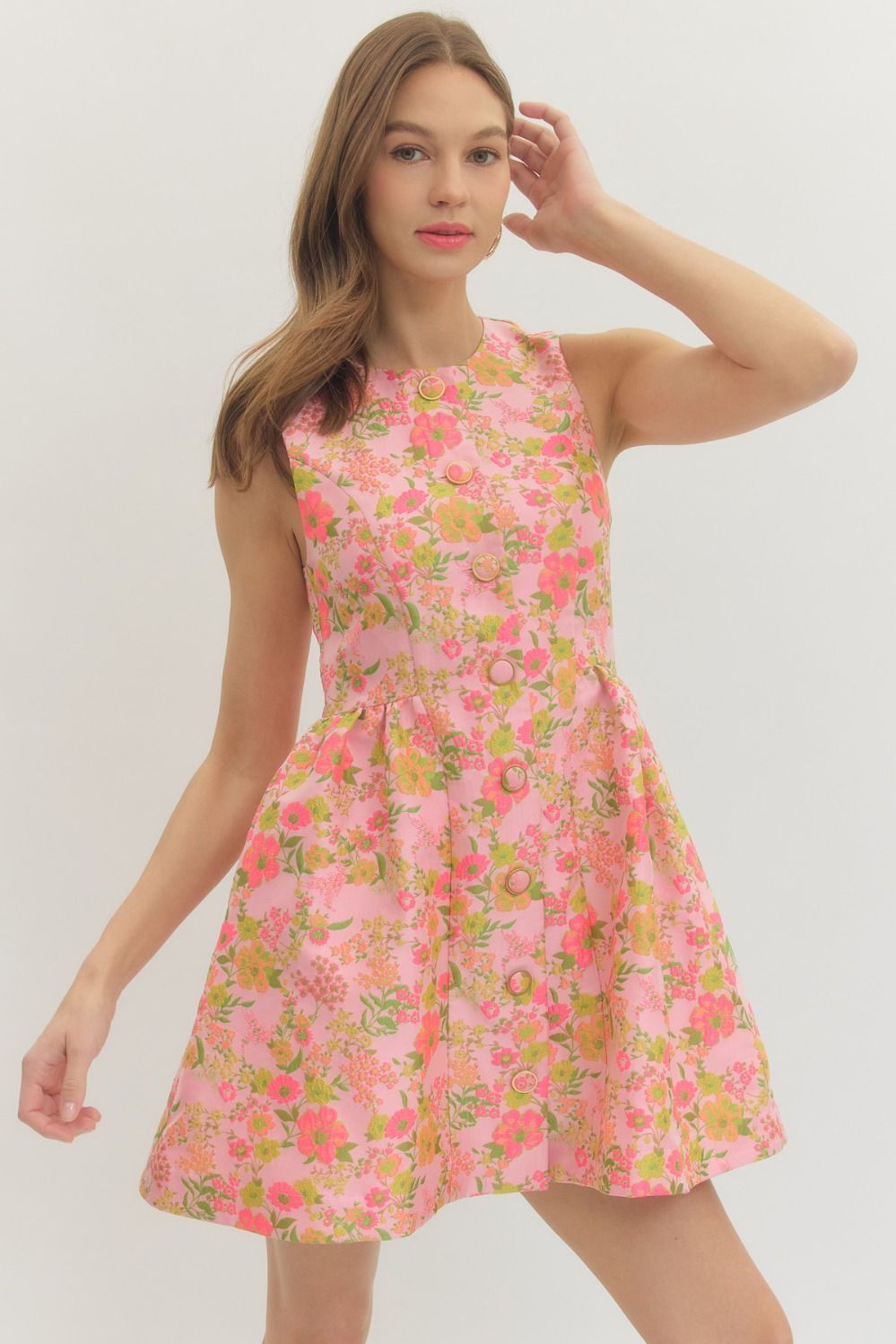 Floral sleeveless mini dress featuring button front design