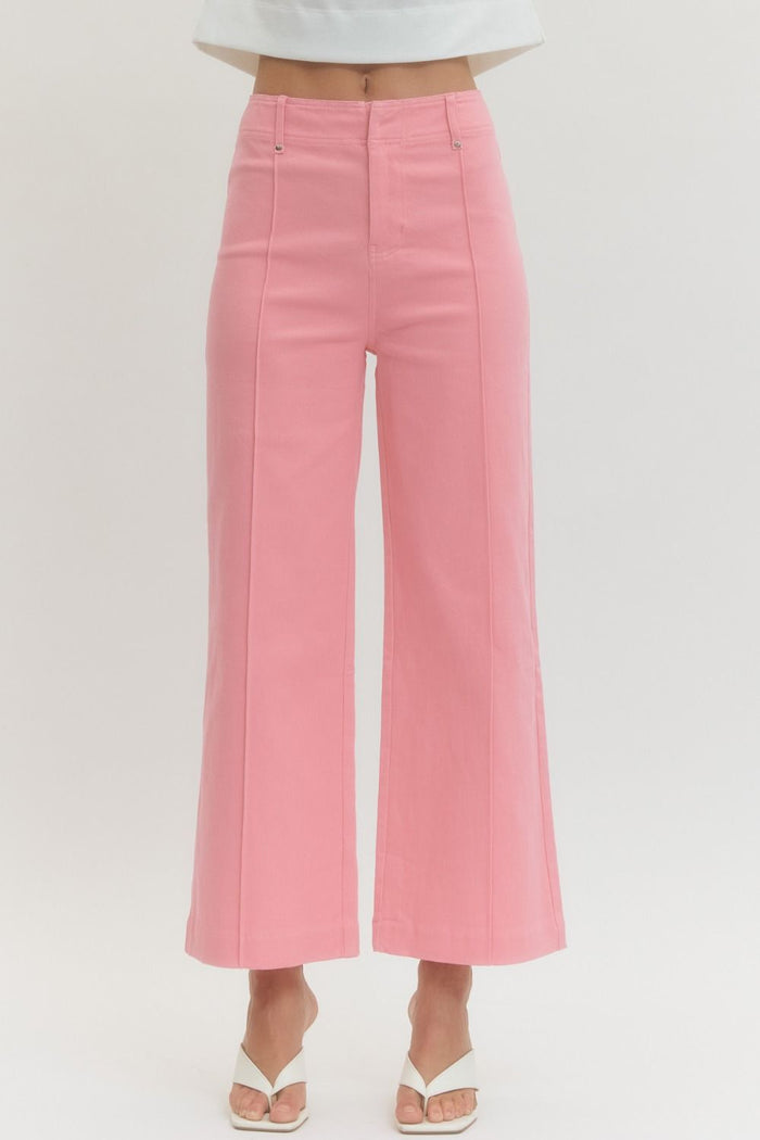 Solid high rise wide leg pants featuring front seam detail.