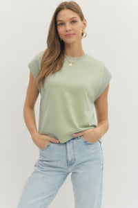 Solid cap sleeve crew neck pullover top.