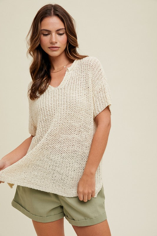 LIGHTWEIGHT OPEN-KNIT SWEATER WITH NOTCH DETAIL