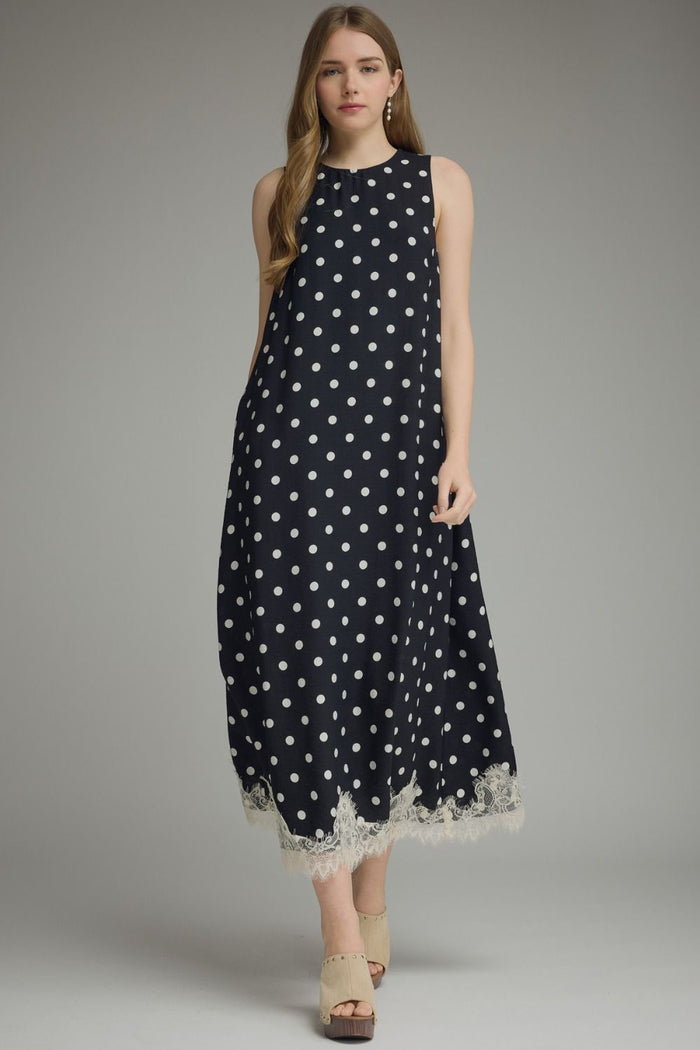 Polka dot sleeveless midi dress featuring lace trim hem