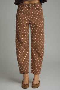 Polka dot pants featuring front and back pockets
