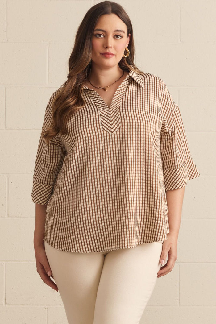 Gingham 3/4 sleeve top featuring V-neck collar detail